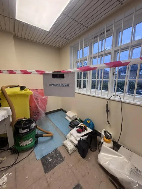 Asbestos floor tile and bitumen removal in Kilburn
